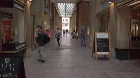 A First-Person View (POV) captures the Pleasure of Walking down a Lively Stock Footage 256735408