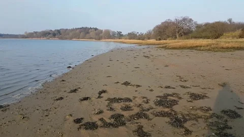 First person view POV walking down a beach, unknown male shadow 動画素材 150116909