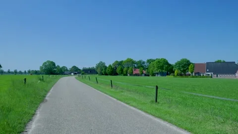First person view riding a bicycle on a rural road Stock Footage 336903085