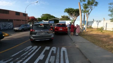 First person view running through the traffic of a school from an air base Видео 150681514