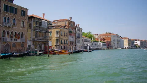 First person view of sailing through the canals of Venice, Italy Stockbeeldmateriaal 295842028