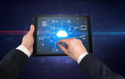 First person view of tablet with cloud office concept Stock Photos