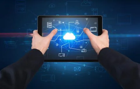 First person view of tablet with cloud office concept Stock Photos