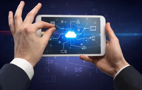 First person view of tablet with cloud office concept Stock Photos