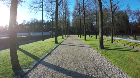 First person view walking gravel path gravel road small white pebbles stones 4k Stock Footage 59242262