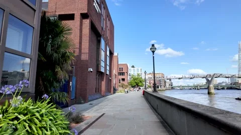 First person view walking on north bank of River Thames near Blackfriars Pier Stock Footage 314428453
