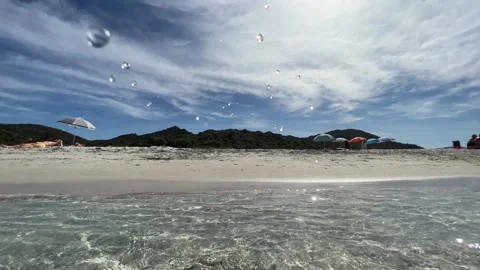 First-person view walking out of sea water of lotu beach in summer season Stock Footage 280691530