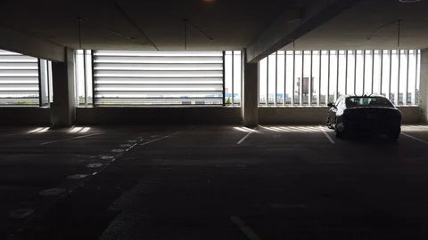 First Person View Walking Through Dark Spooky Parking Lot On Upper Level Dur Stock Footage 129258010