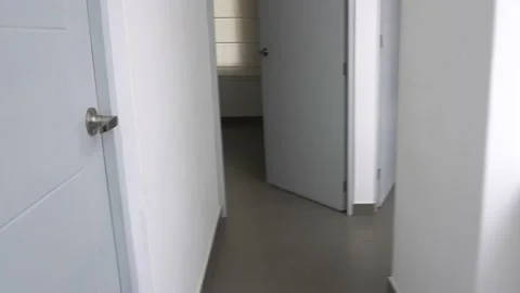 First person view walking through an apartment looking for friends in their Stock Footage 155795172