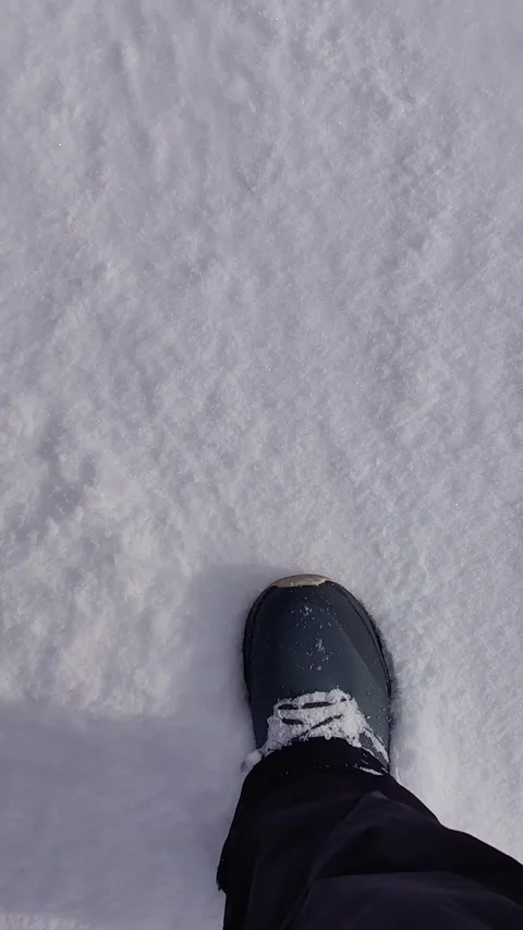 First-person view walking through deep fresh snow. vertical. Stock Footage 329164172