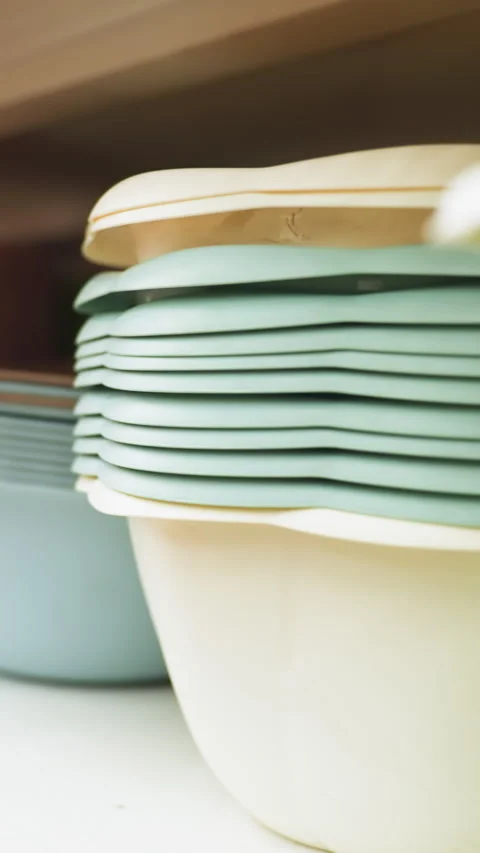 First-Person View of Well-Arranged Bowls in Different Sizes and Colors on Stock Footage 316501059