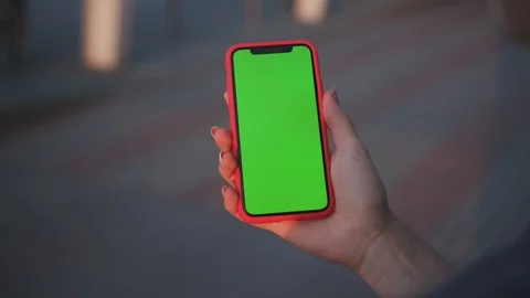 First-person view young human holds a modern device smartphone mock up chroma Stock Footage 112061103
