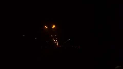 First person view.car ride on a night road lit by street lamps Stock Footage 124268760