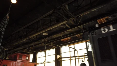 First Person Walking Through Old Warehouse With Rafters And Dirty Windows Video stock 121199052