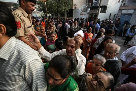 First phase of Gujarat state Assembly Election in Rajkot, India - 09 Dec 2017 Stock Photos