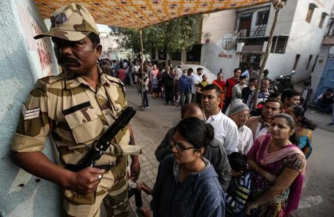 First phase of Gujarat state Assembly Election in Rajkot, India - 09 Dec 2017 Stock Photos