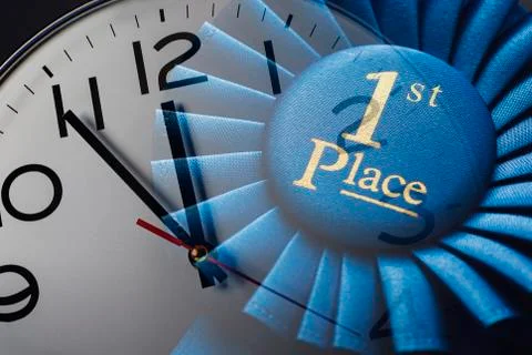 First place winners rosette over a clock dial Stock Photos