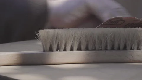 First plan hand brush, old man's hand sanding Video stock 140369188