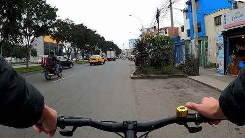 First POV view riding a bicycle along Los Proceres avenue through Prosegur, Stock Footage 160520456
