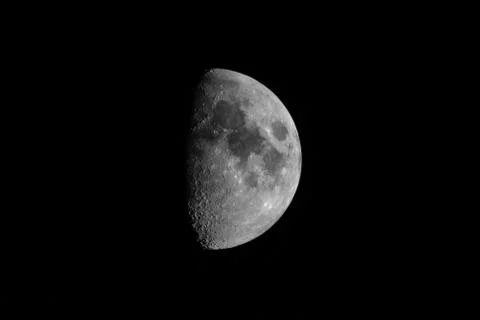 First Quarter Phase of the Moon Stock Photos