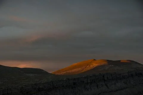 The first rays of light appearing in a cloudy morning Stock-Fotos