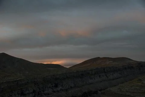 The first rays of light appearing in a cloudy morning 스톡 사진