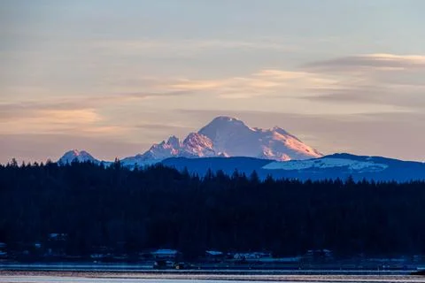 The first rays of light hitting Mt Baker Stock-Fotos