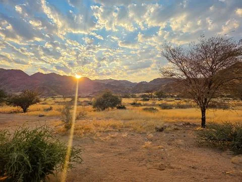 The first rays of sun at Solitaire mountain lodge, Solitaire, Namibia Stock Photos