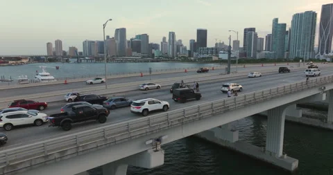 First responders help at vehicle collision on bridge road. Car crash in Miami Stock Footage 280179480