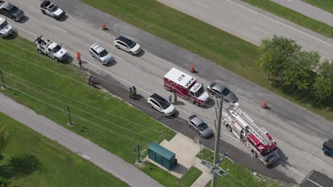 First responders responding to car accident site on American street. Emergency Stock Footage 301713883