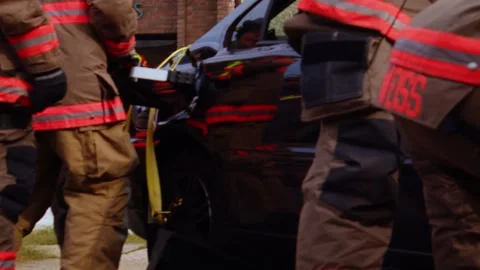 First Responders Securing Crash Site and Assessing Vehicle Damage Stock Footage 317960786