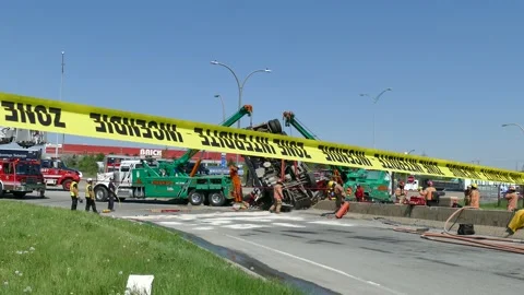 First responders working on crash with yellow tape Stock Footage 133269714