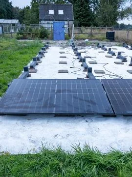 First Row of Solar Panels Placed on Supports Photo 8 of 16 Stock Photos
