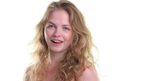 First serious from profile, than smile in camera Video stock 314563314