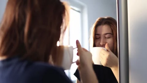 First sip of coffee brings calm and joy Stock Footage 328043017