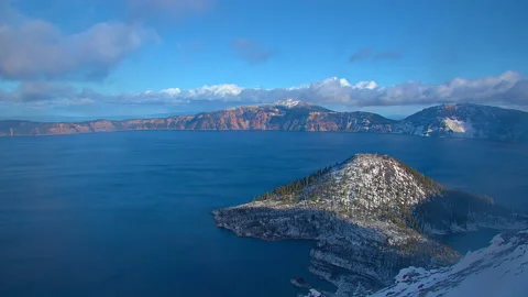 First snow and bitter cold arrive on Wizard Island Crater Lake, Oregon Stock Footage 168213541