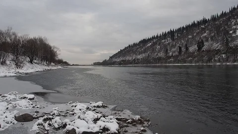First snow in the autumn forest by the river. Stock Footage 82220744
