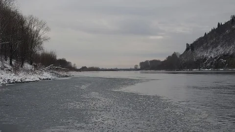 First snow in the autumn forest by the river. Stock Footage 82220752