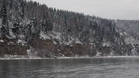 First snow in the autumn forest by the river. Stock Footage 82220765