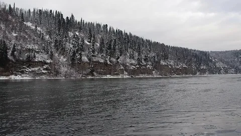 First snow in the autumn forest by the river. Stock Footage 82220766