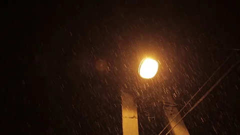 First snow descends on the night city street Stock Footage 70052035