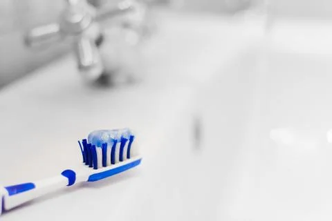 First snow on a dry maple leaf Stock Photos