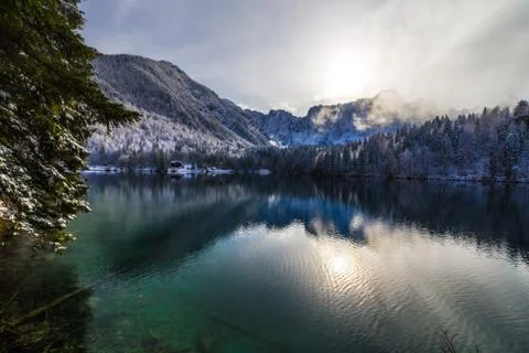First snow at the mountain lake Stock Photos