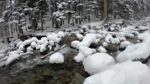 The first snow on the mountain river Stock Footage 145356114