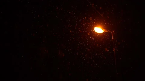 The first snow at night on the background of a street lamp Stock Footage 144015091