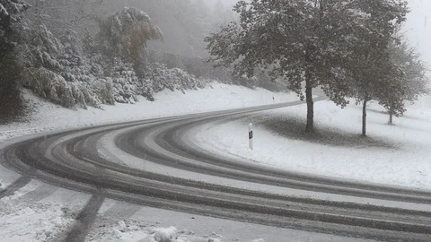 The first snow at the turn of the road Stock Footage 97817223