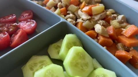 First solid food, healthy baby meal with meat stew on the table of high chair Stock Footage 304735742
