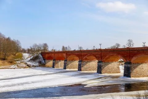 The first spring thawed patches on the river Stock Photos