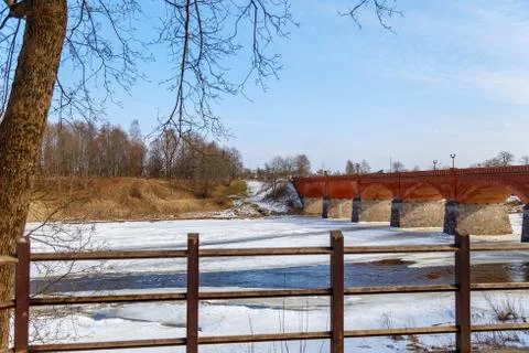 The first spring thawed patches on the river Stock Photos