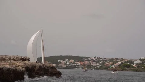 First stage of Copa del Rey vintage yacht regatta gets underway from Mahón harbo Stock-Footage 343676776
